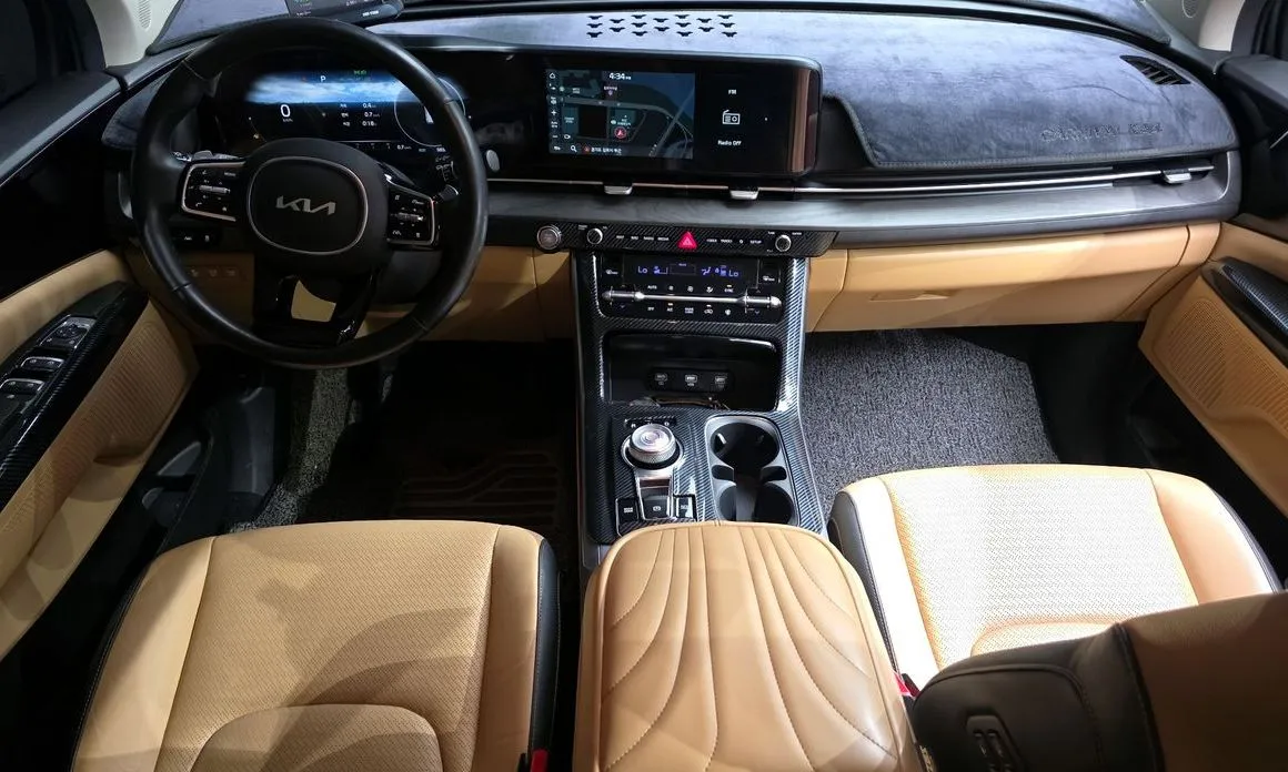 Kia Carnival — фото 10