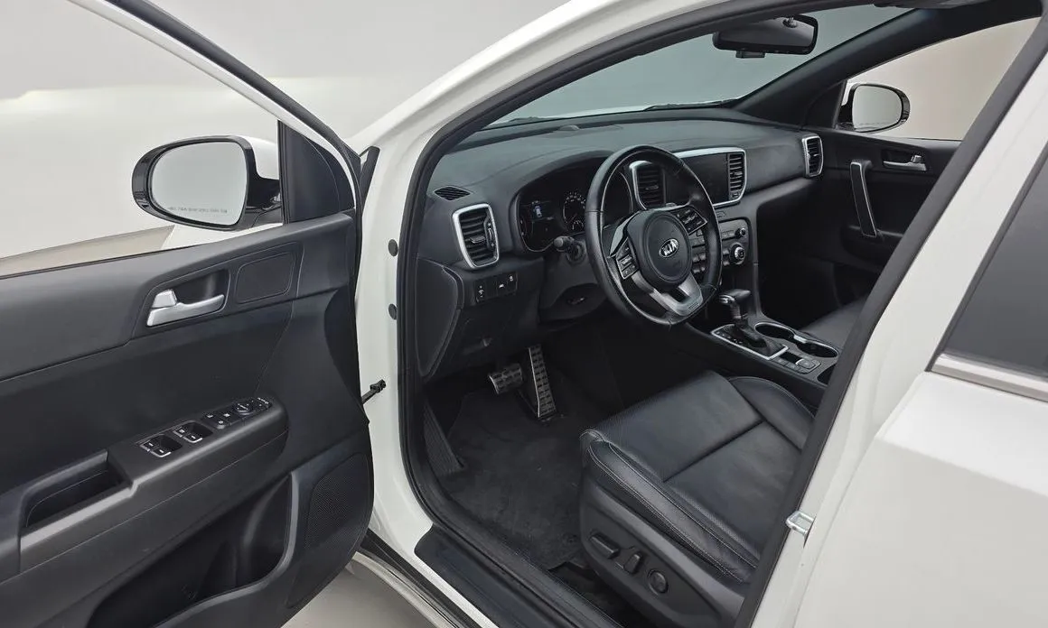 Kia Sportage — фото 5