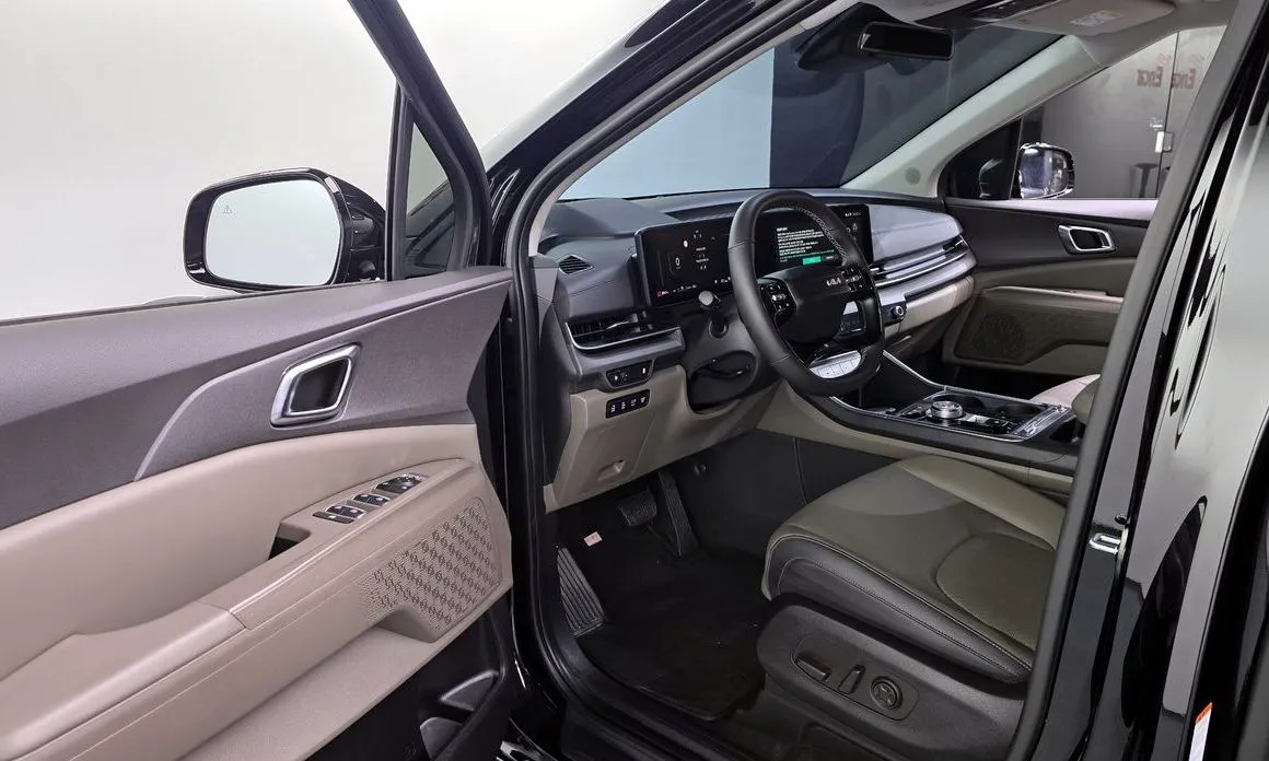 Kia Carnival — фото 10