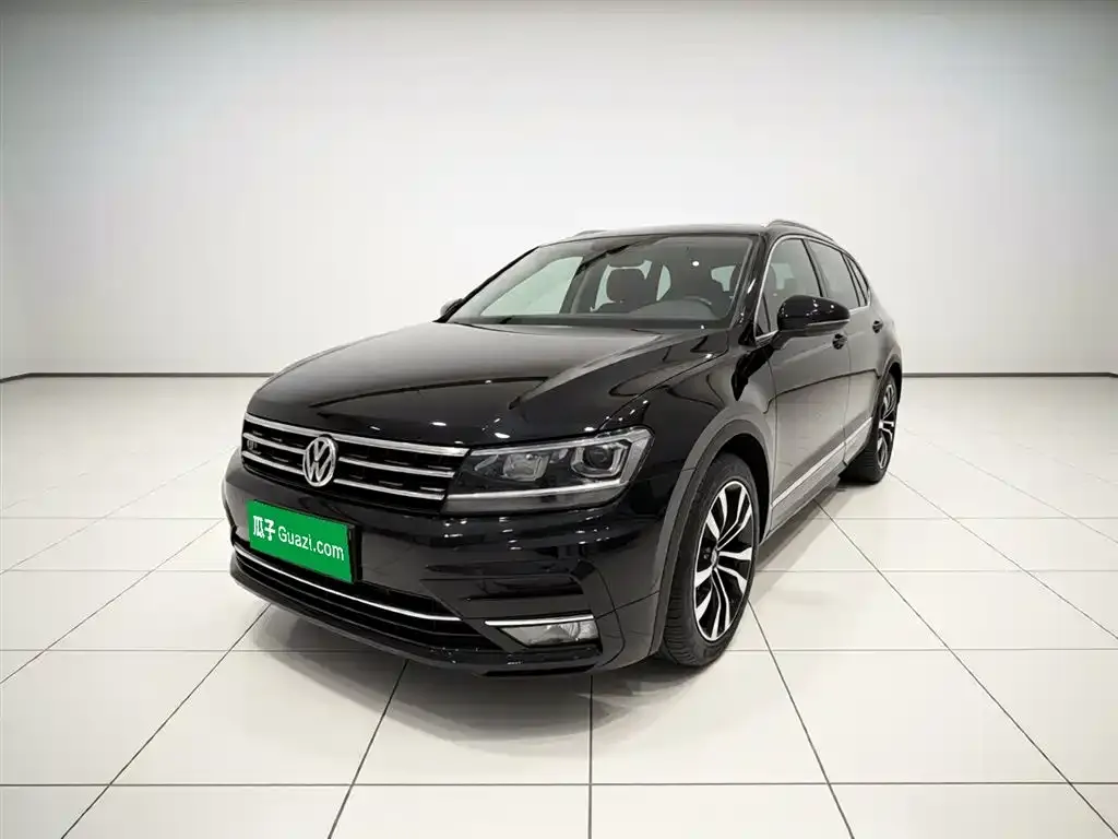 Volkswagen Tiguan L — фото 1