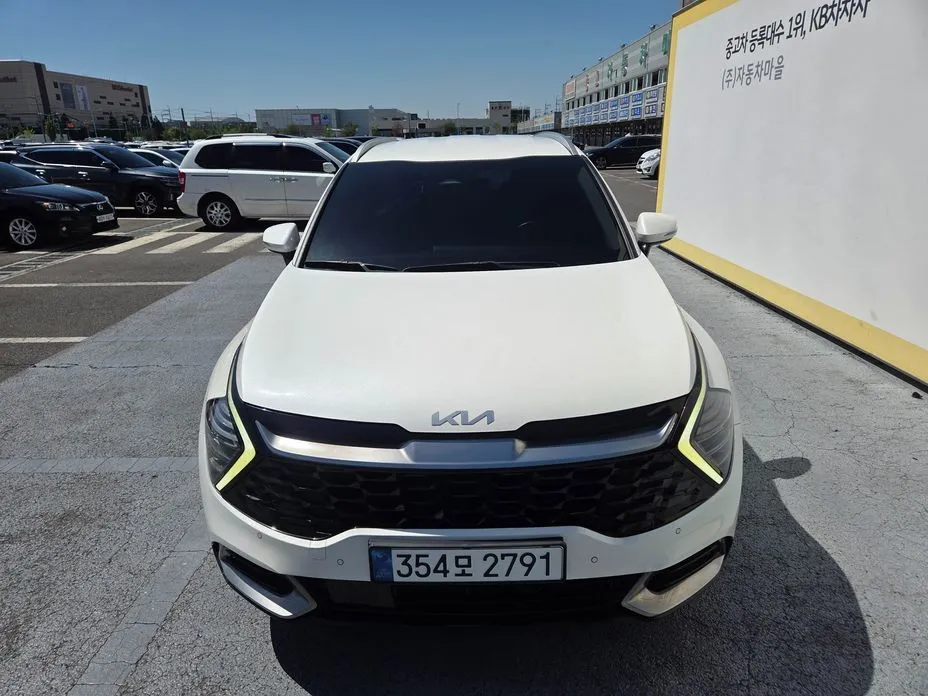 Kia Sportage — фото 8