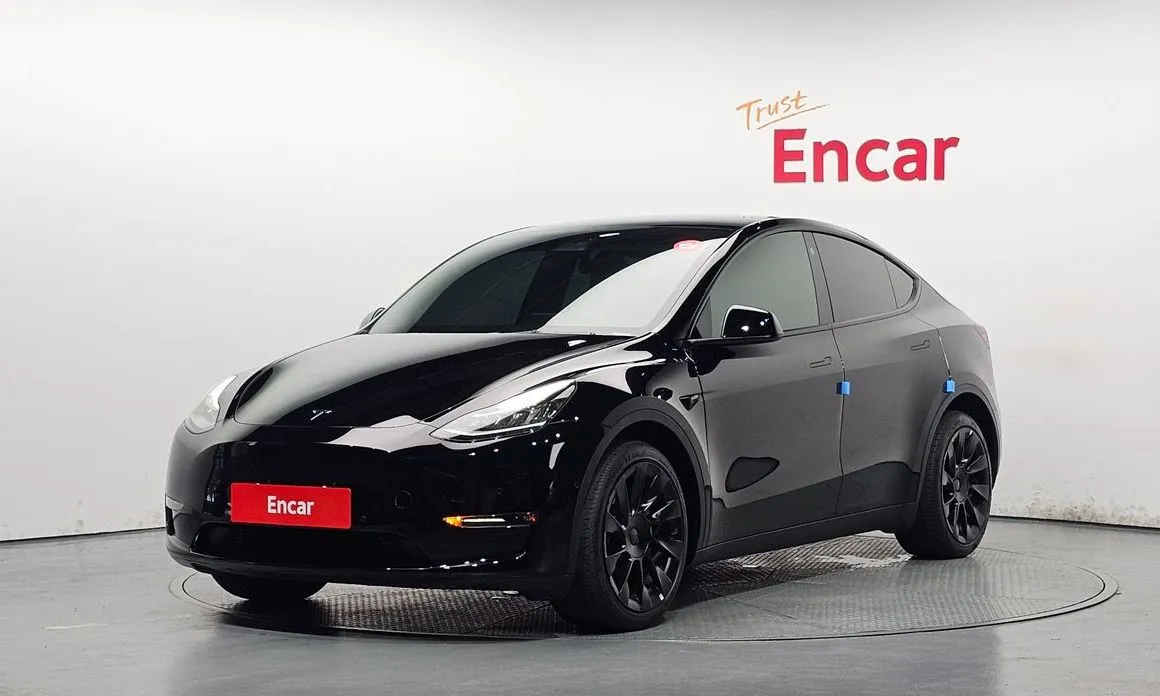 Tesla Model Y — фото 1