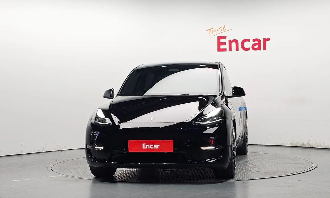Tesla Model Y — фото 8