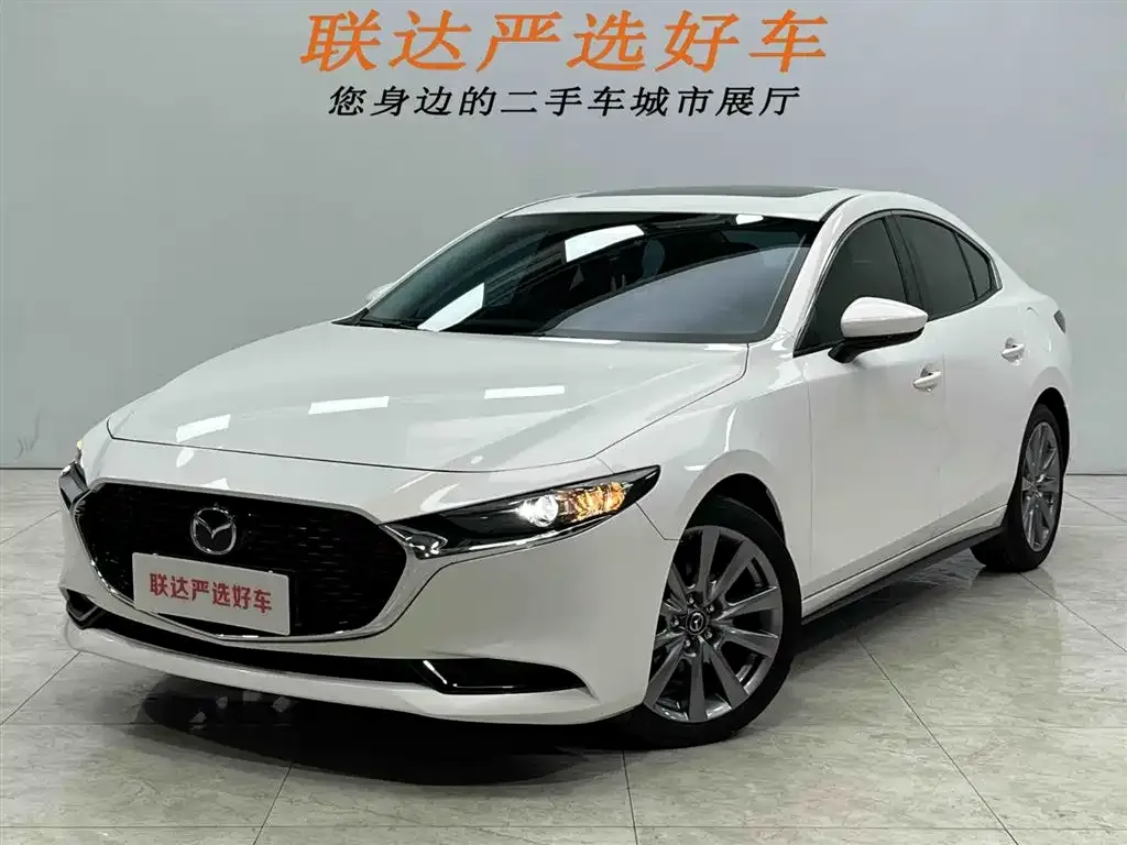 Mazda 3 Axela — фото 1