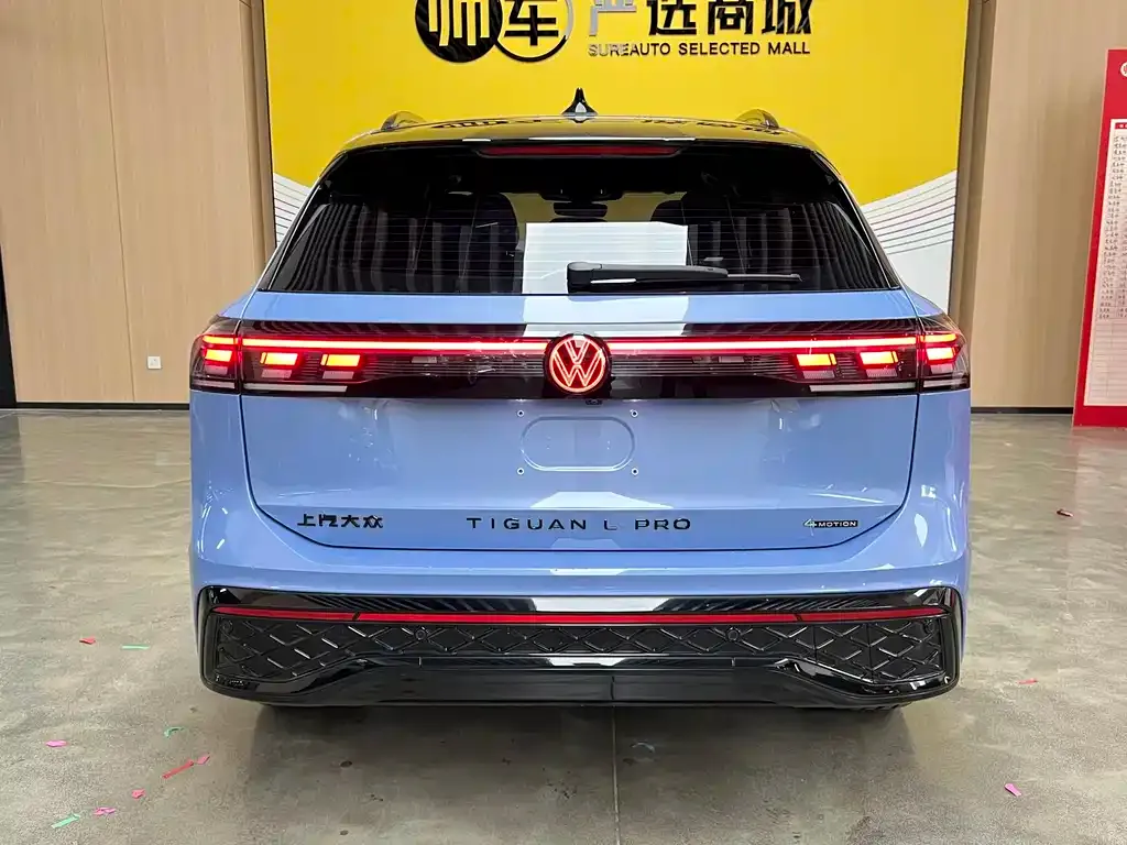 Volkswagen Tiguan L — фото 3