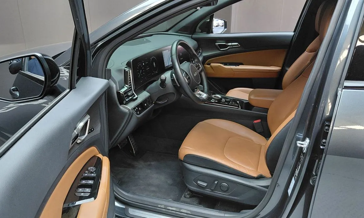 Kia Sportage — фото 9