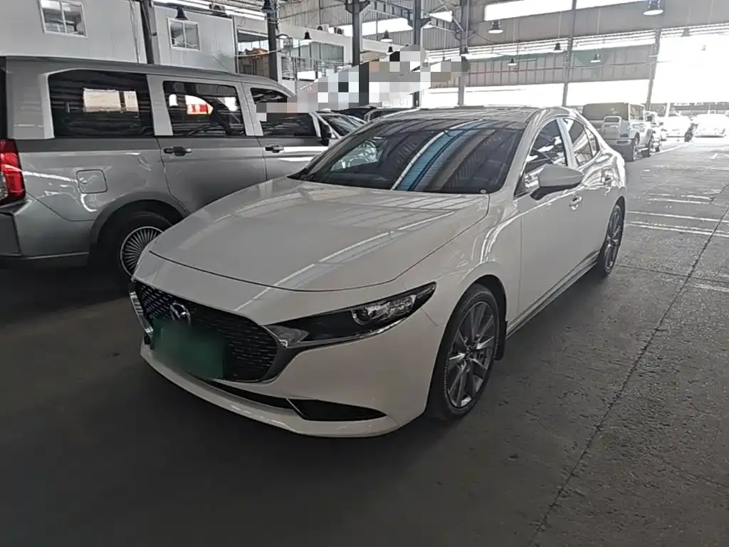 Mazda 3 Axela — фото 1