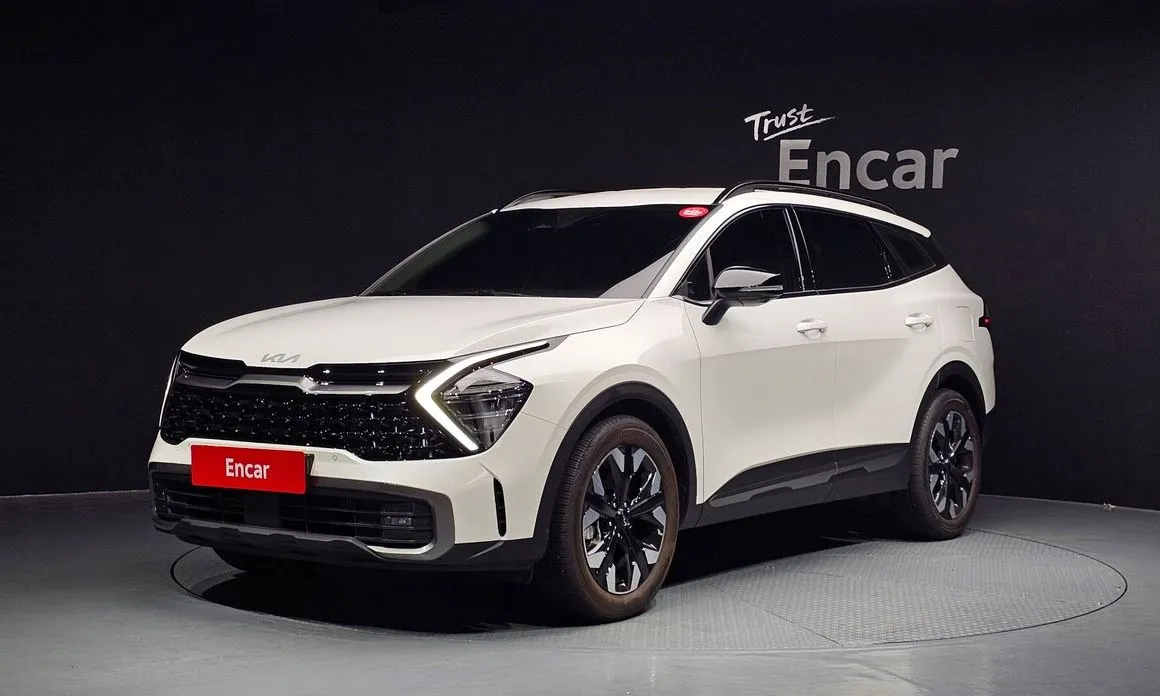 Kia Sportage — фото 1