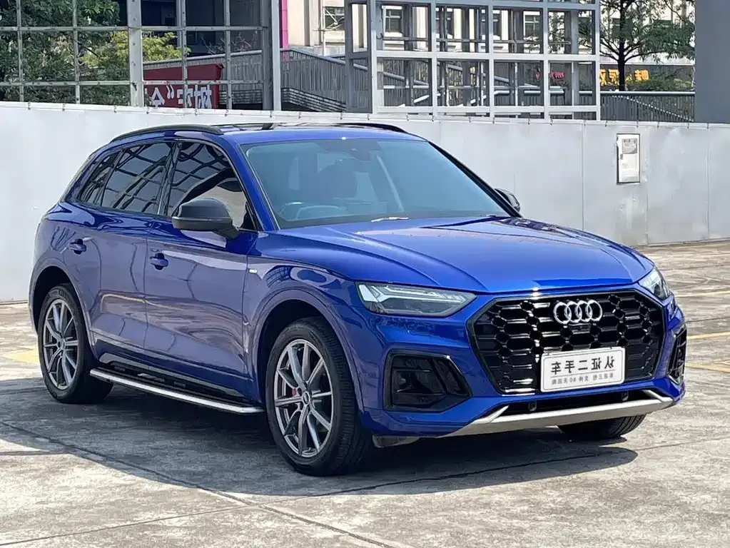 Audi Q5L — фото 10