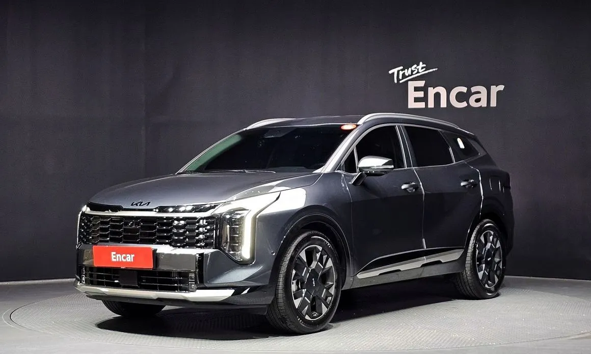Kia Sportage — фото 1