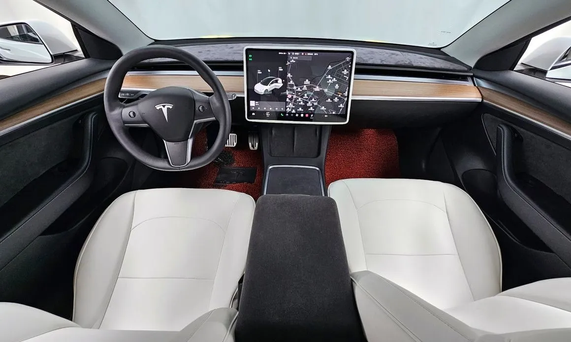 Tesla Model 3 — фото 10