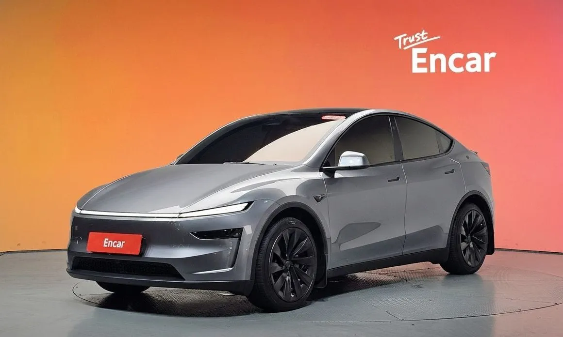 Tesla Model Y — фото 1