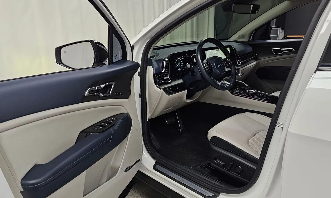 Kia Sportage — фото 8