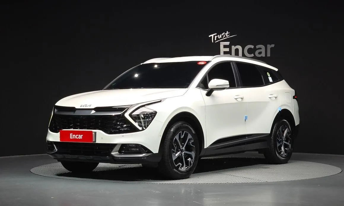 Kia Sportage — фото 1