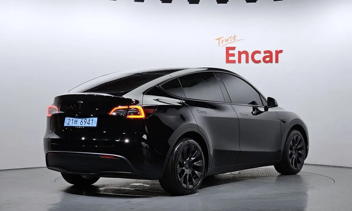 Tesla Model Y — фото 7