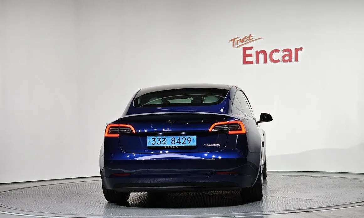 Tesla Model 3 — фото 7