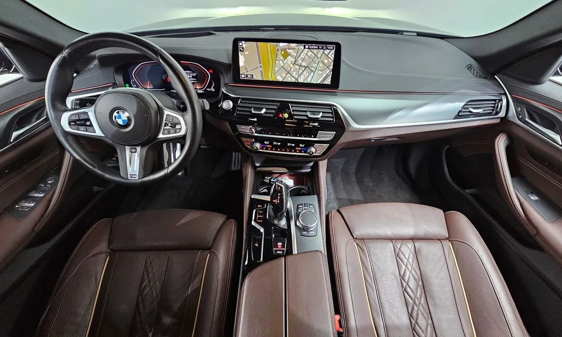 BMW 5-Series — фото 10