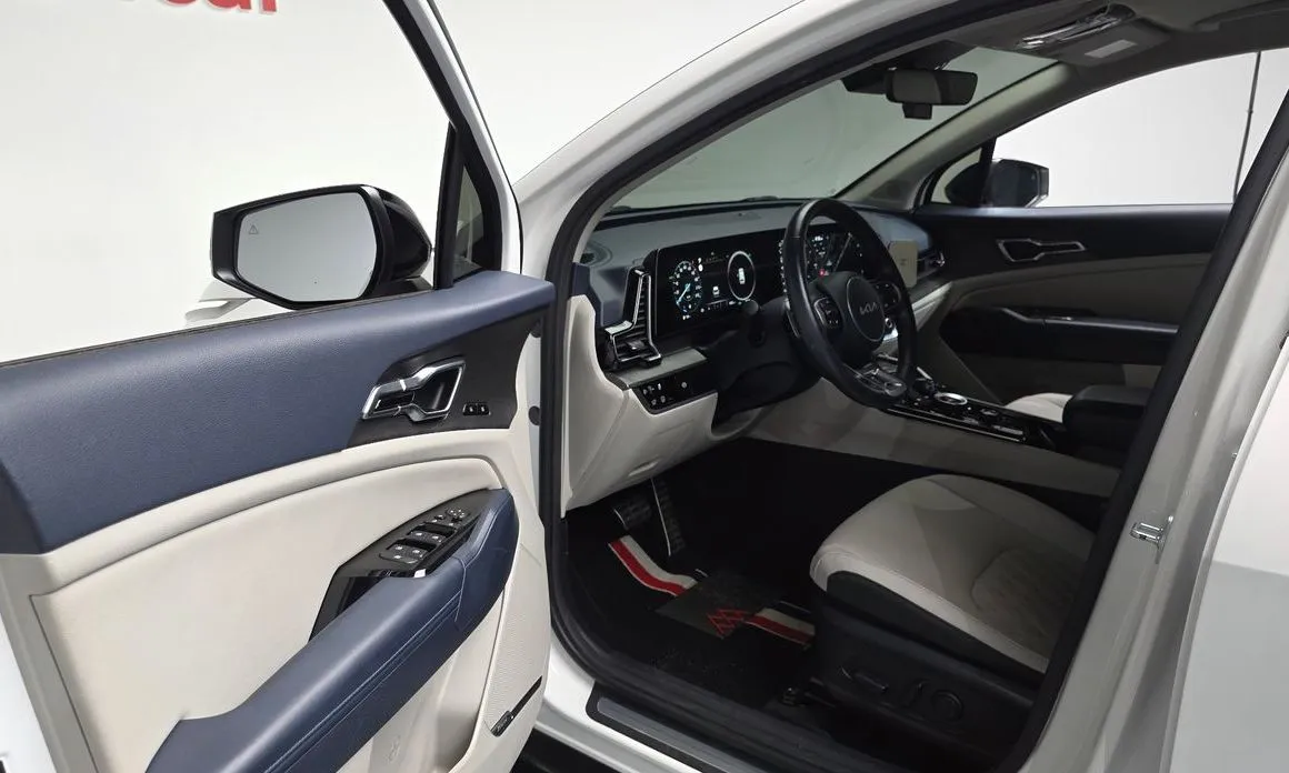 Kia Sportage — фото 10