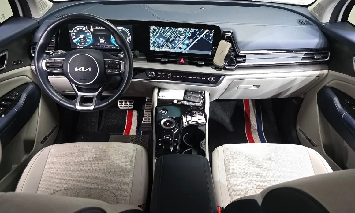 Kia Sportage — фото 9