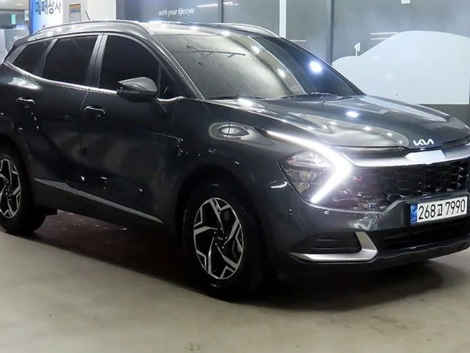 Kia Sportage — фото 1