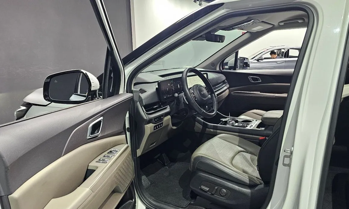 Kia Carnival — фото 10