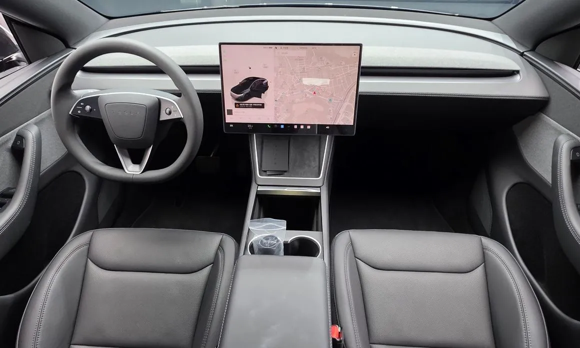 Tesla Model Y — фото 9