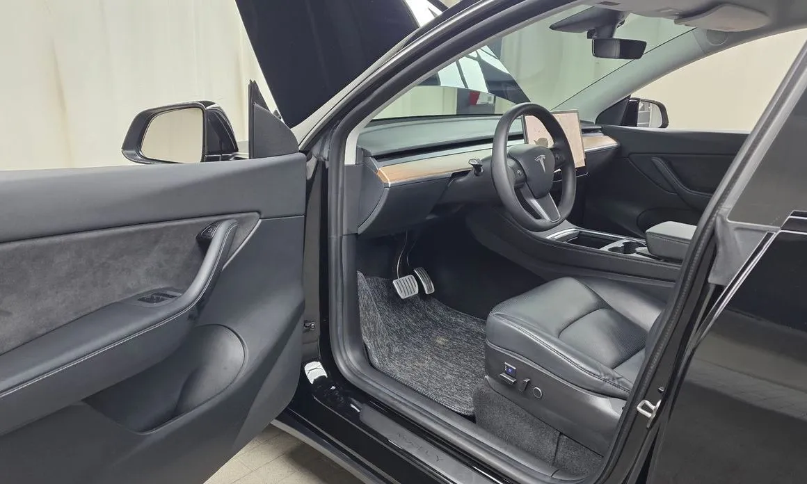 Tesla Model Y — фото 9