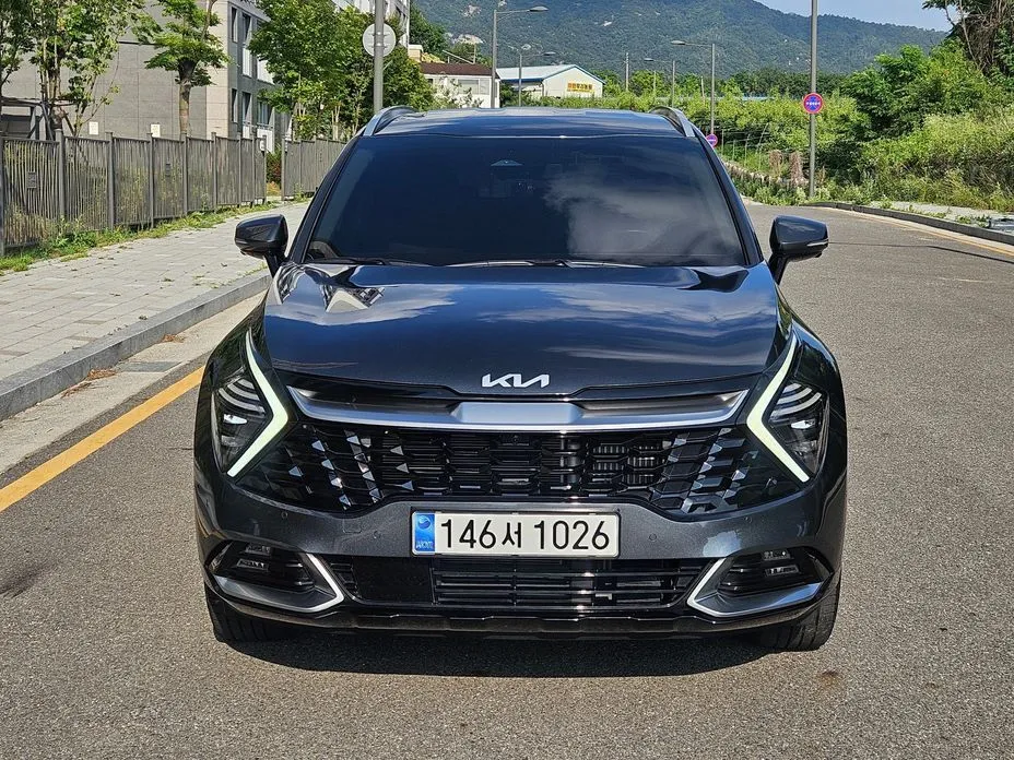Kia Sportage — фото 1