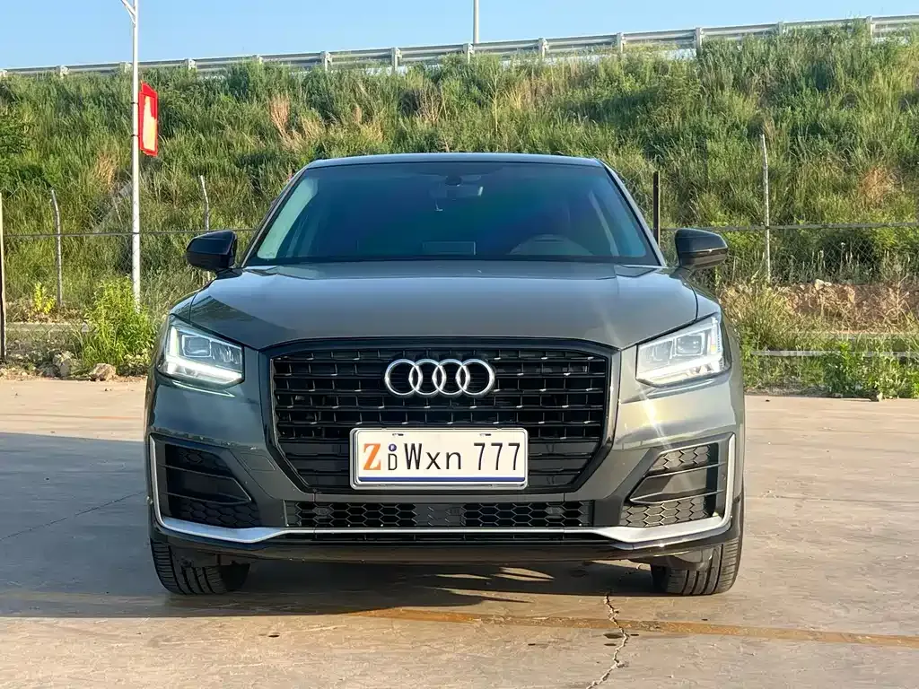Audi Q2L — фото 8