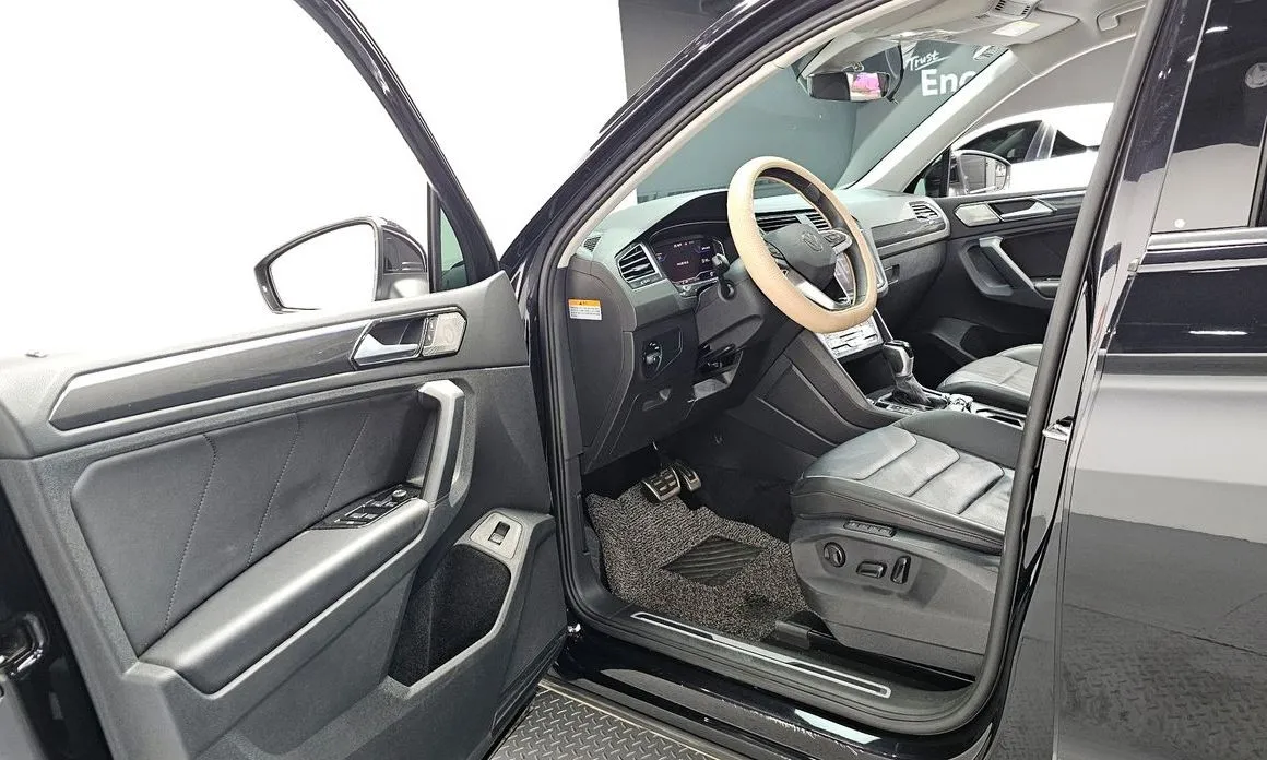 Volkswagen Tiguan — фото 7