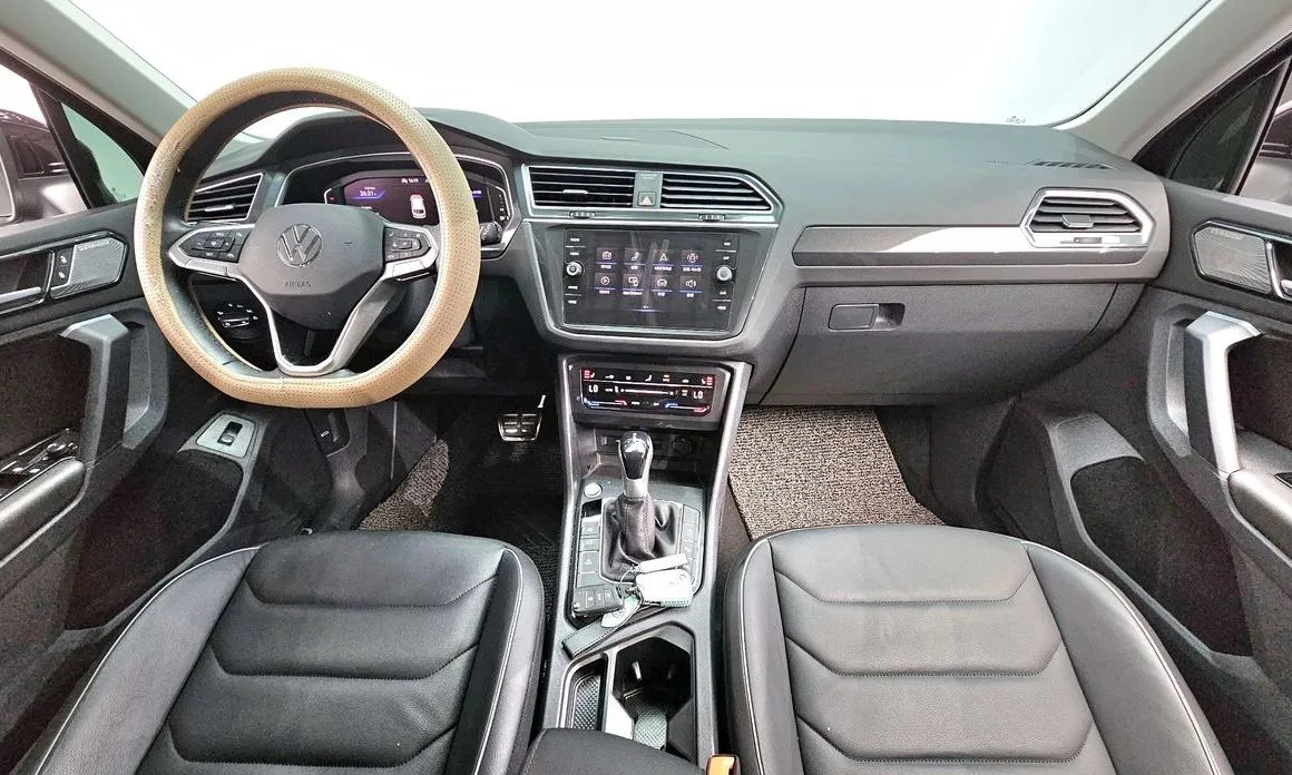 Volkswagen Tiguan — фото 9