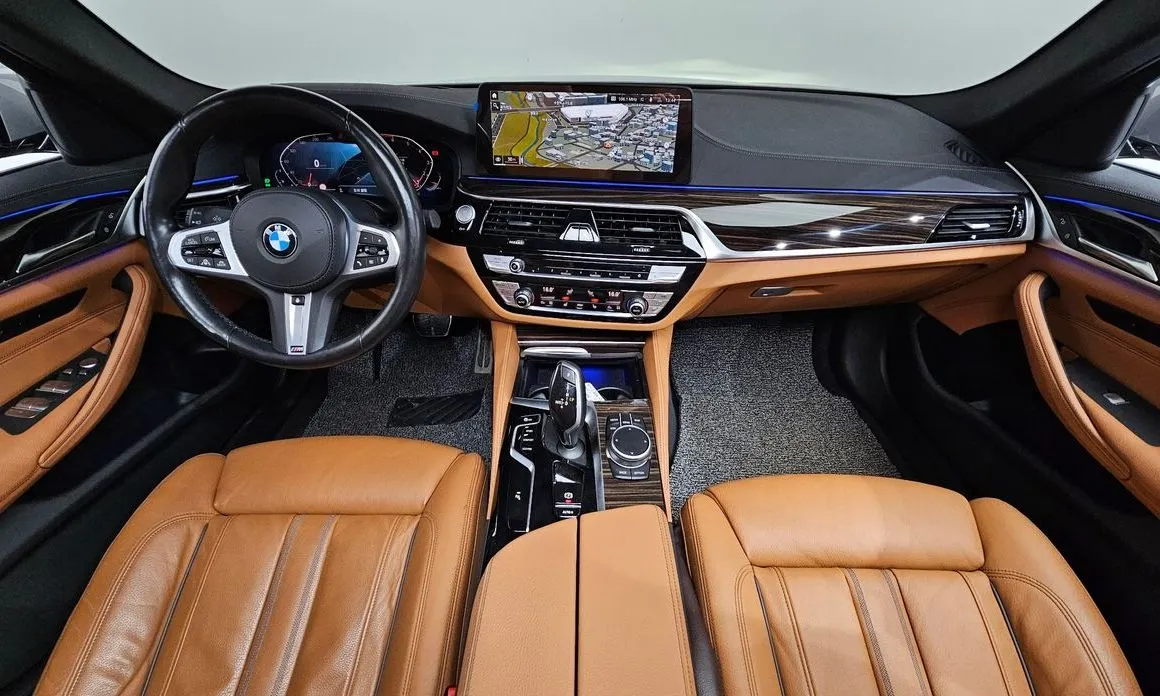 BMW 5-Series — фото 10
