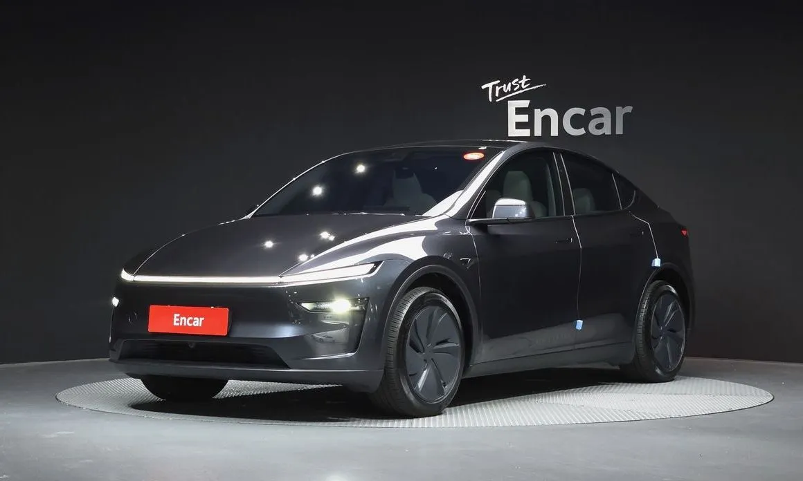 Tesla Model Y — фото 1