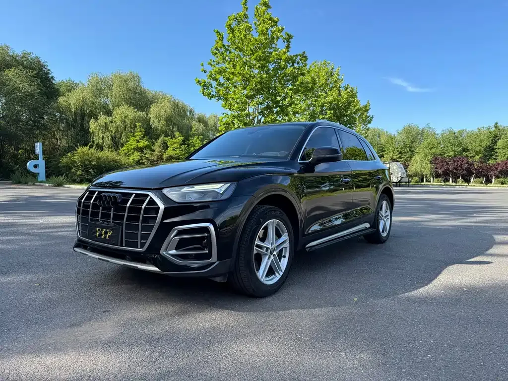 Audi Q5L — фото 10