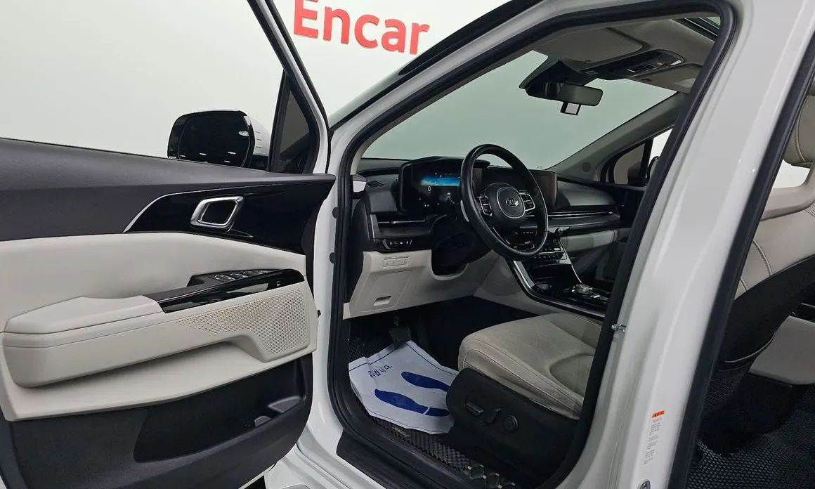 Kia Carnival — фото 10