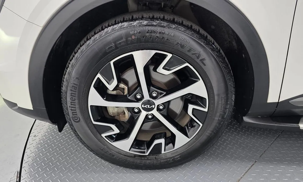 Kia Sportage — фото 10