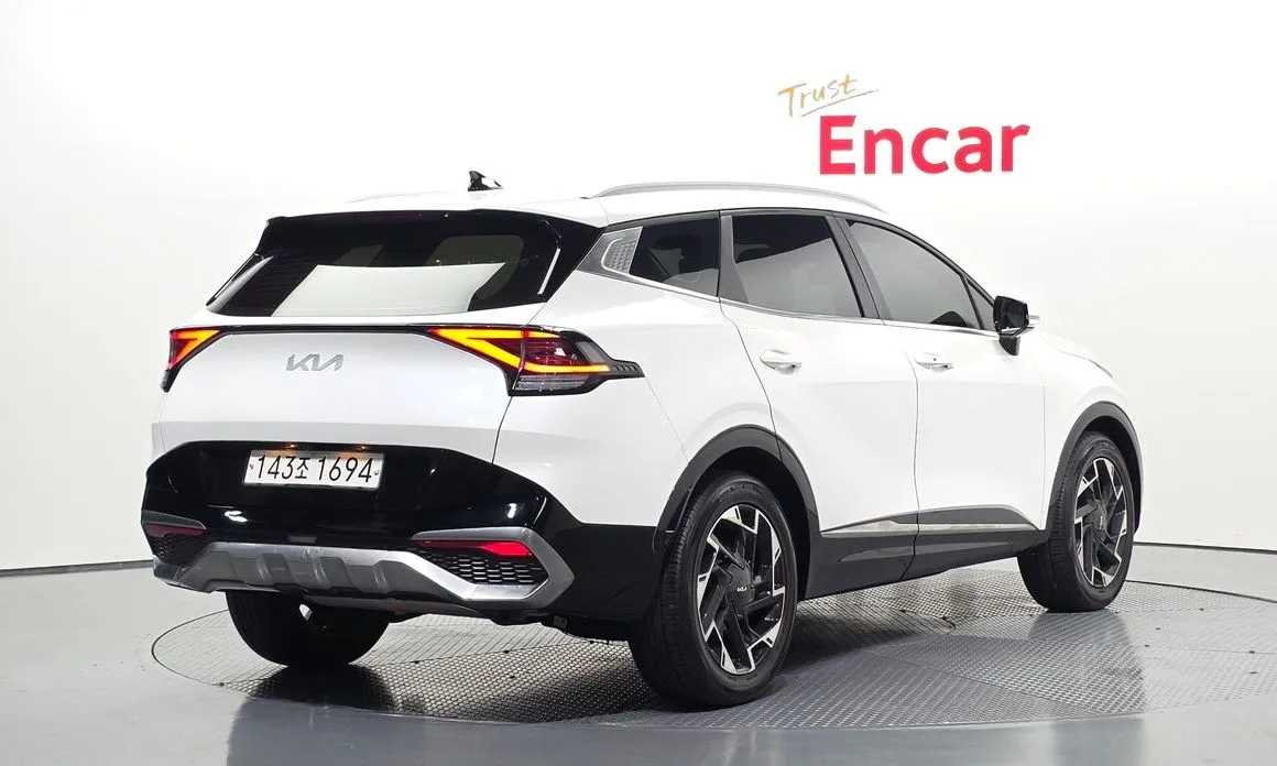 Kia Sportage — фото 6