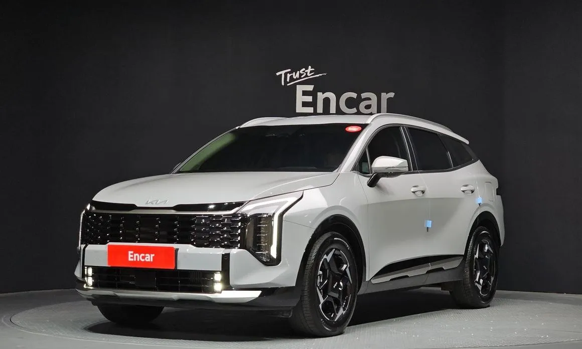 Kia Sportage — фото 1