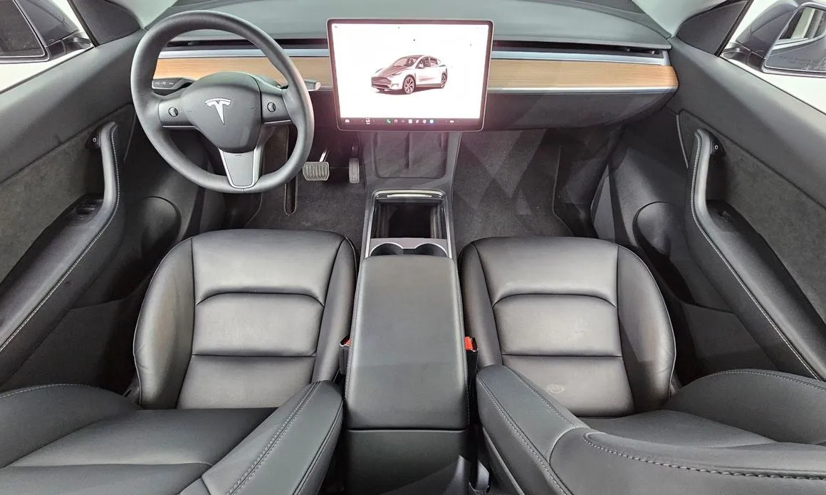 Tesla Model Y — фото 7