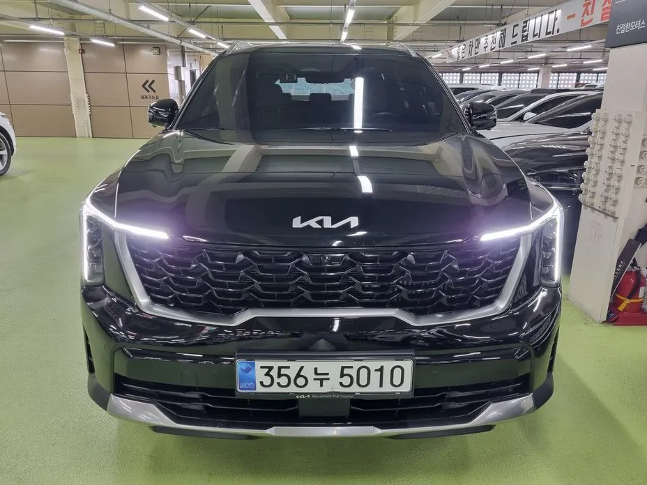 Kia Sorento — фото 7