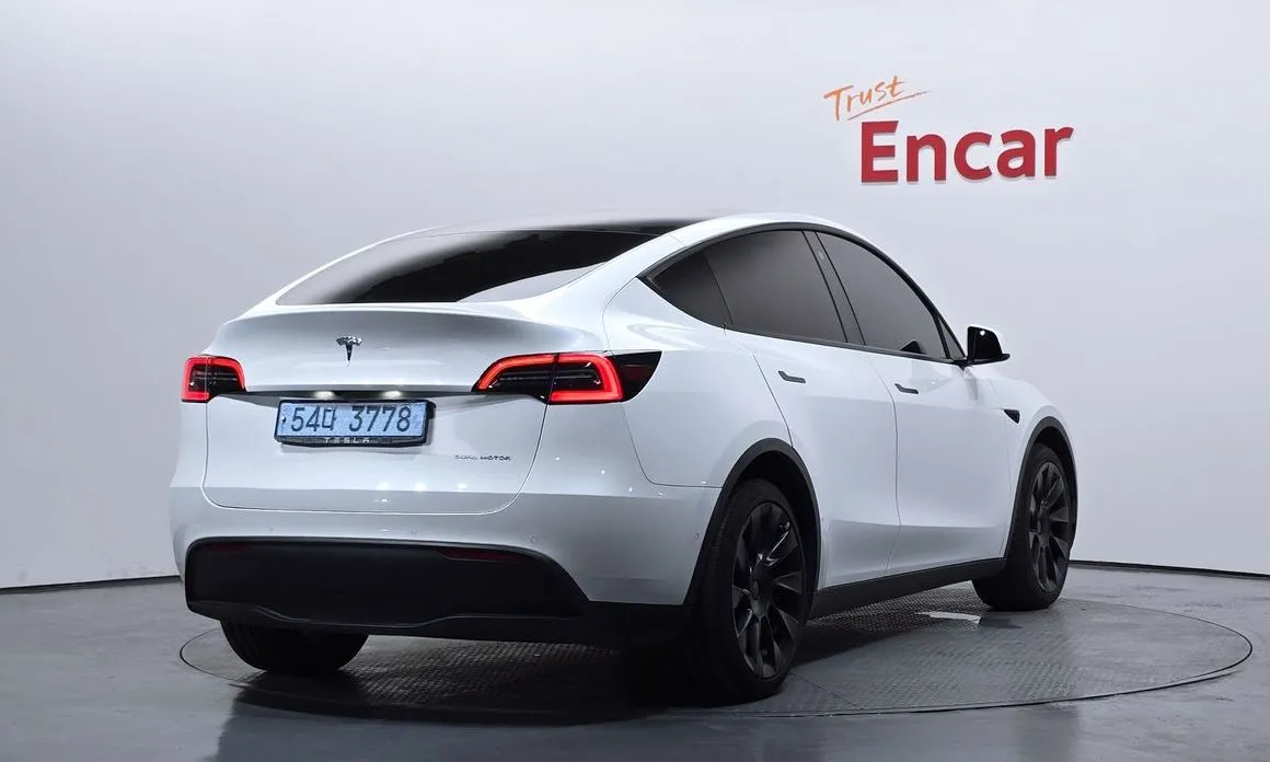 Tesla Model Y — фото 7