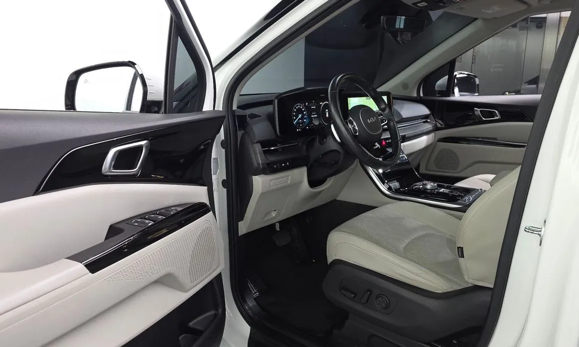 Kia Carnival — фото 10