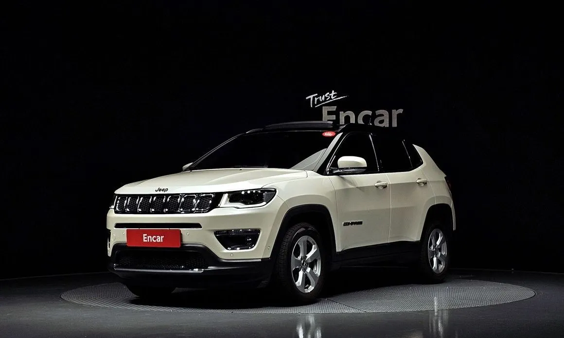 Jeep Compass — фото 1