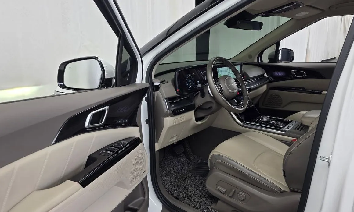 Kia Carnival — фото 10