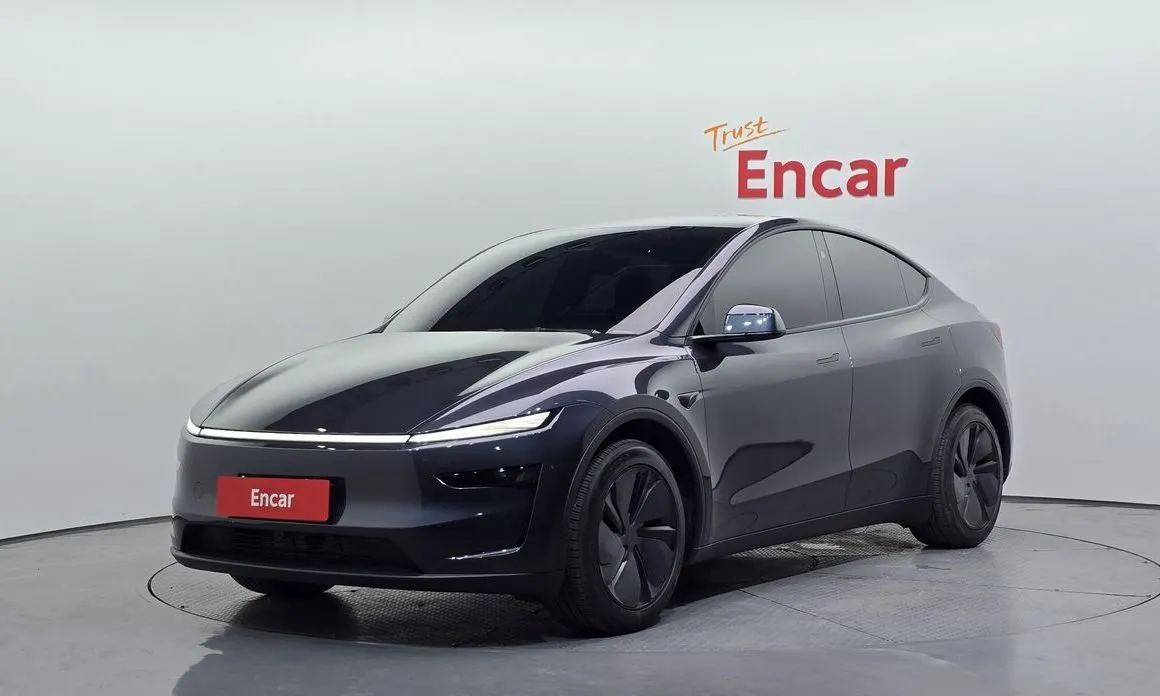 Tesla Model Y — фото 1