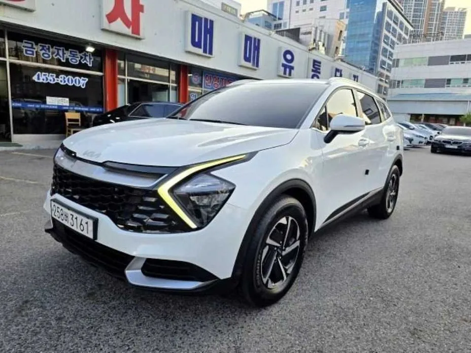 Kia Sportage — фото 1
