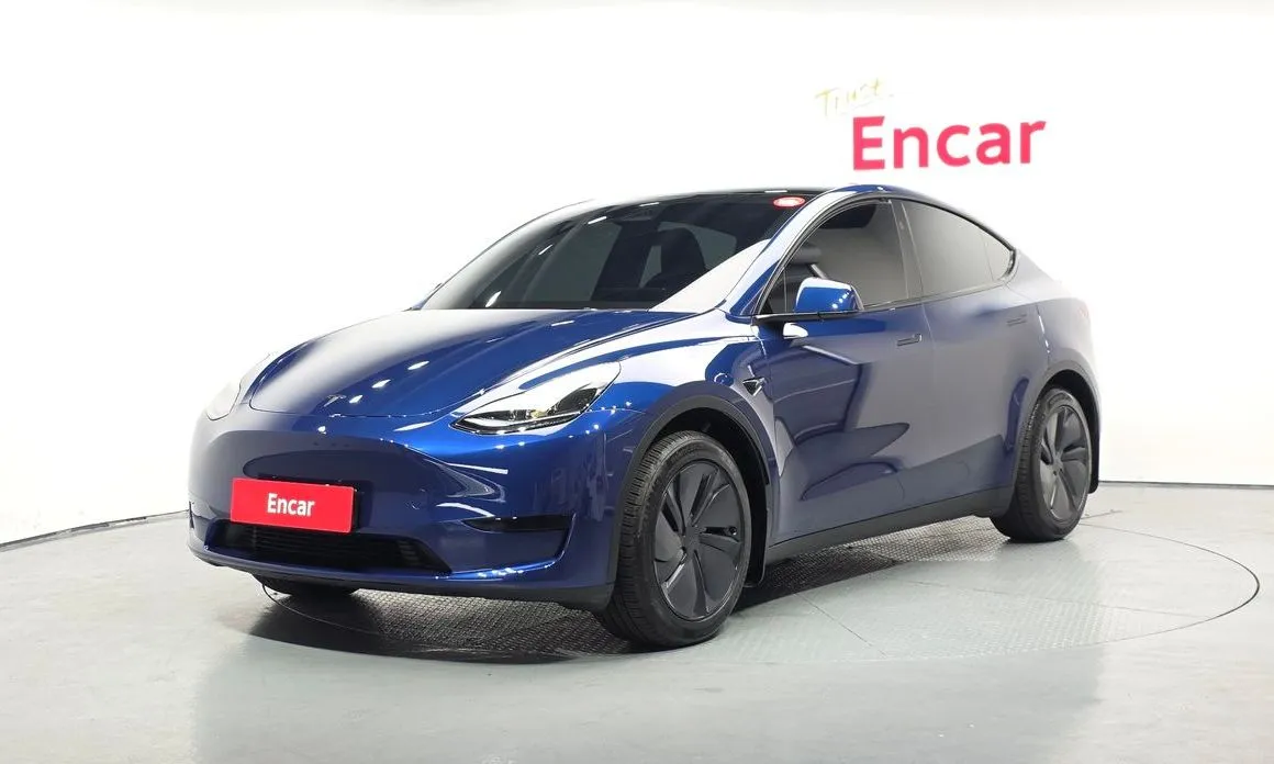 Tesla Model Y — фото 1