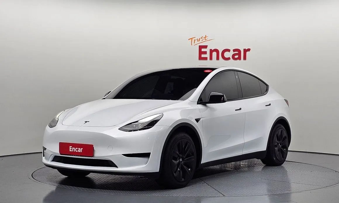 Tesla Model Y — фото 1