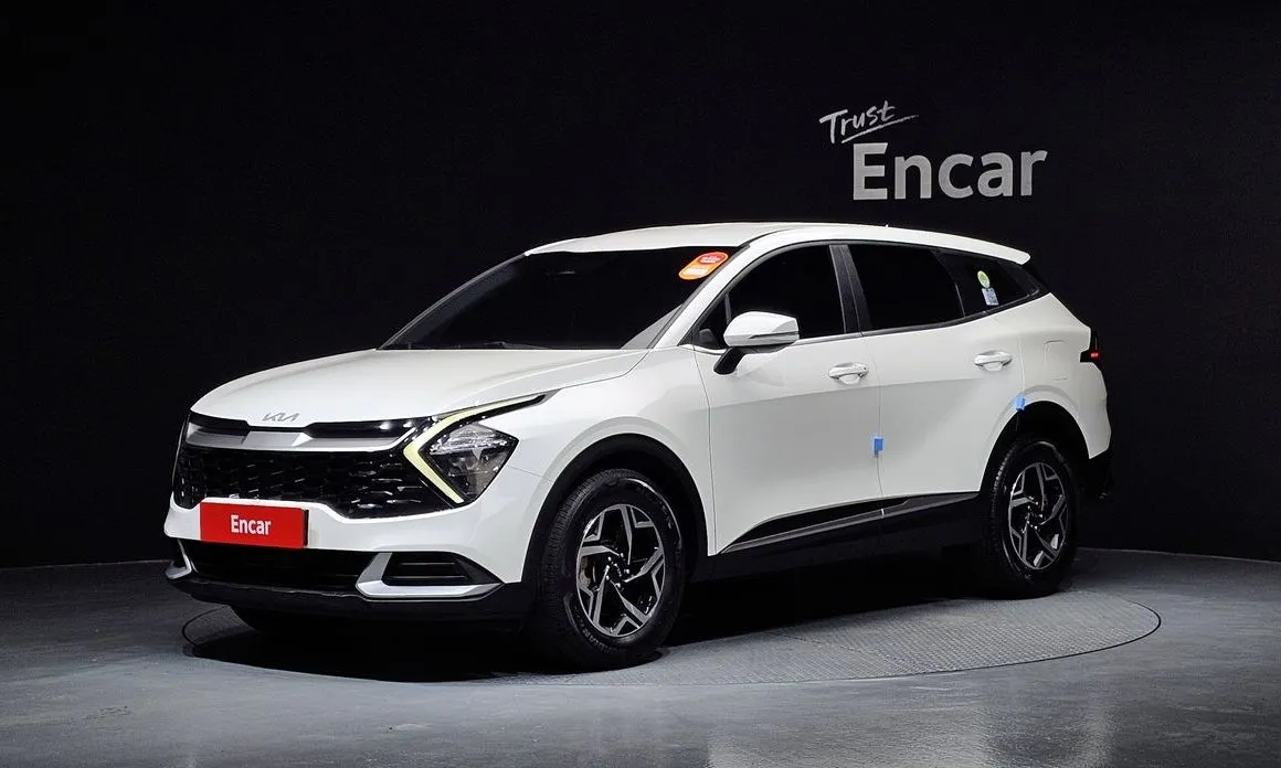 Kia Sportage — фото 1
