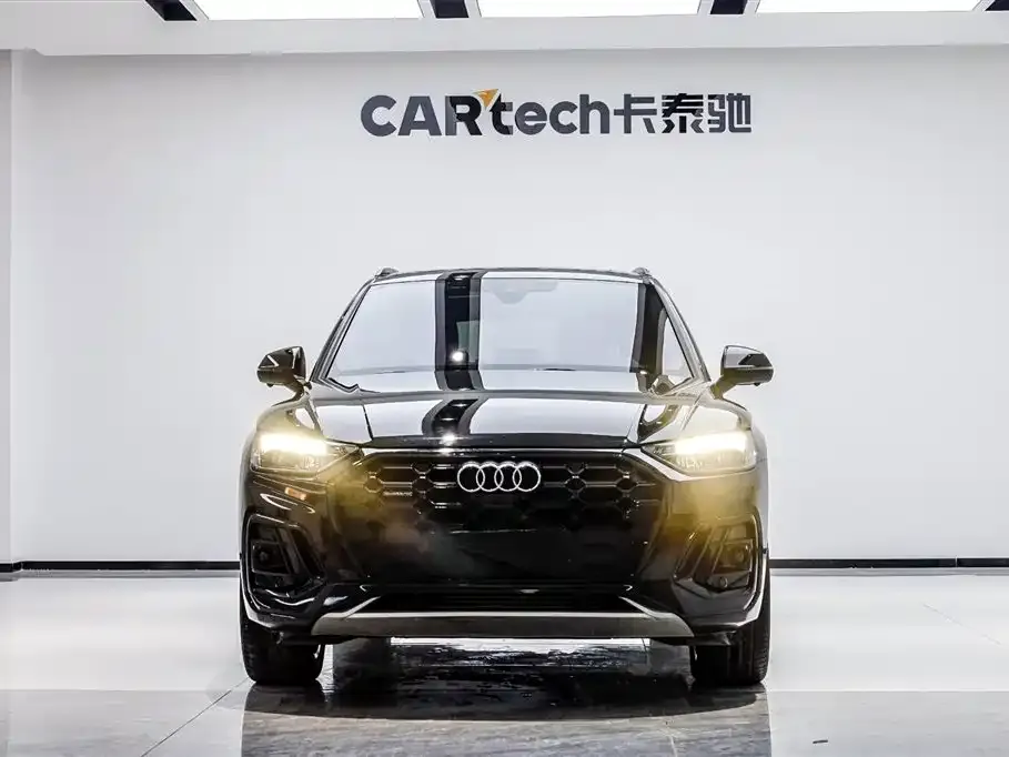 Audi Q5L — фото 6